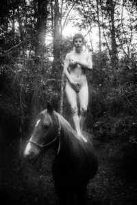 Masha Models standing on horse